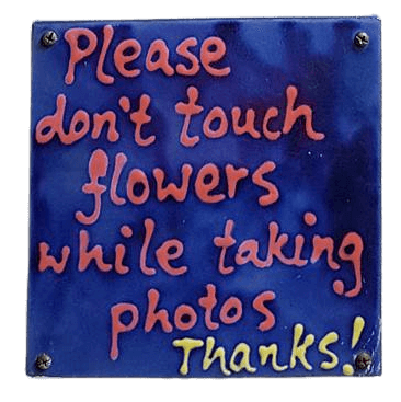 Don't touch flowers sign